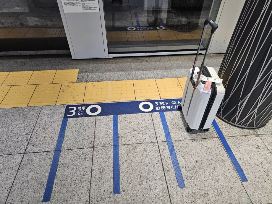 Subir al metro - señales de cola