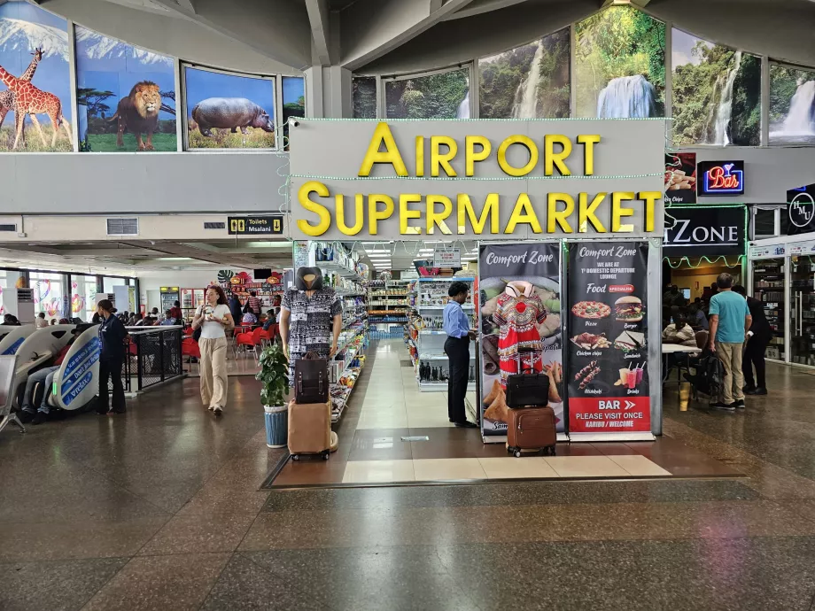 Tienda de comestibles, zona de tránsito, terminal 2